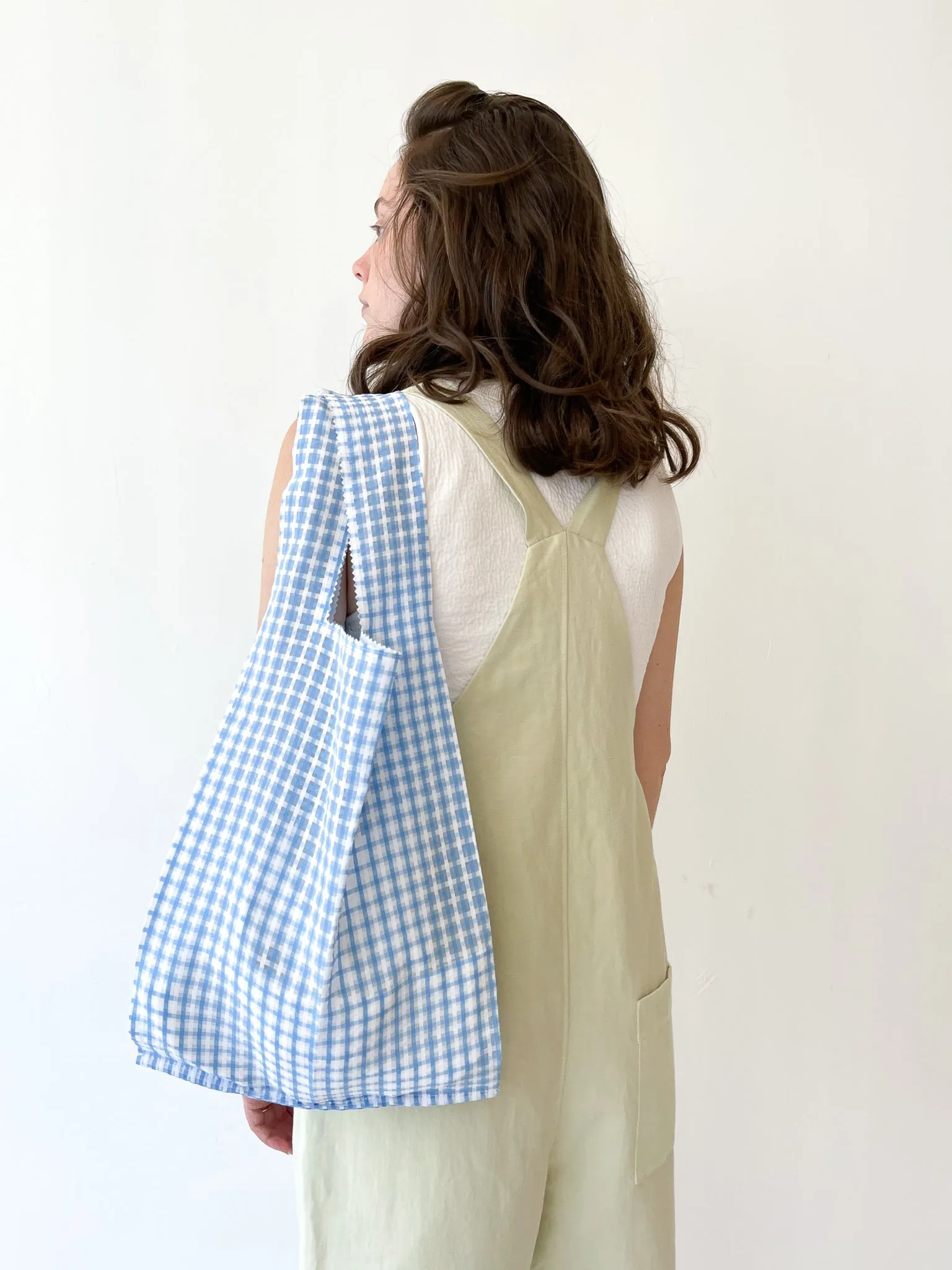 PICKUP blue and white grid pattern bag