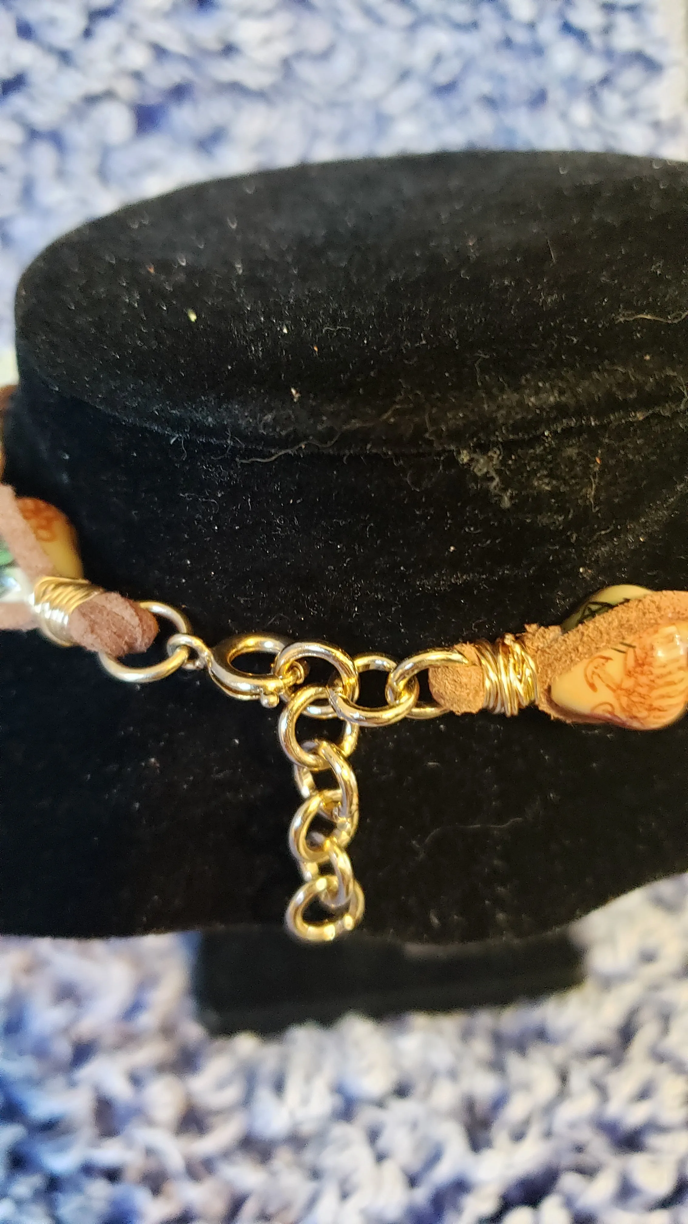 Puka Shell Choker with Brown Genuine Leather, Adjustable up to 13" with Oriental Ceramic Accent, Gold Tone Stainless Steel Chain & Spring Ring Clasp
 